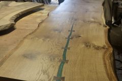 Oak-dining-table-with-green-resin-and-bow-ties-2-scaled